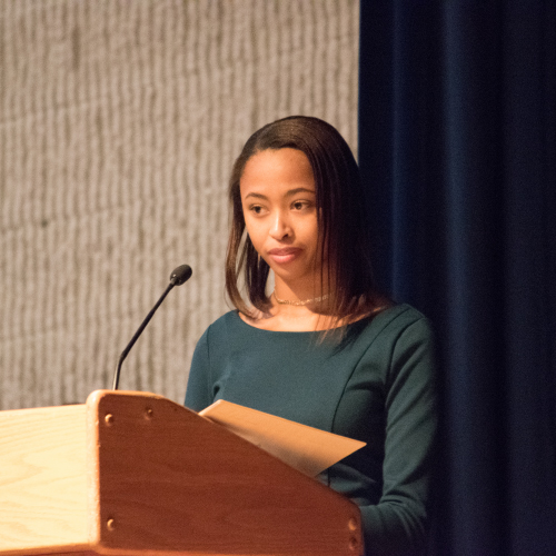  An image of McCluer North High School Student, Cheyenne Parson, speaking at a podium. 